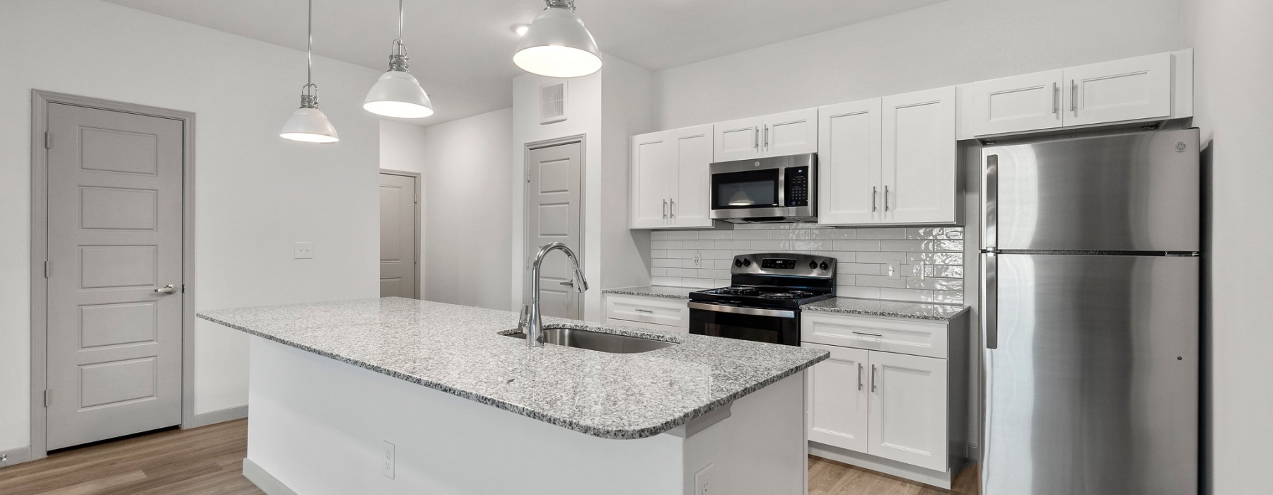 Well-lit kitchen with ample counter space